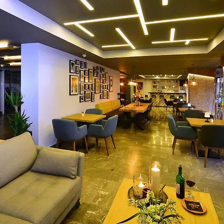 & Aparthotel